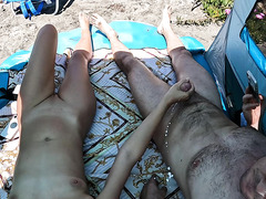 We have a lot of spectators during a handjob session on a public beach